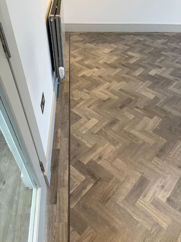 Grey herringbone with feature strip