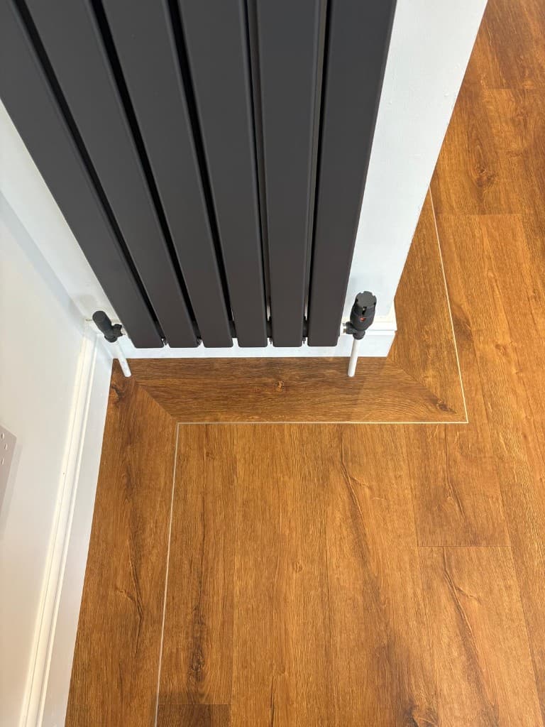 Herringbone LVT flooring installation with custom border — Parfait Flooring, Glasgow